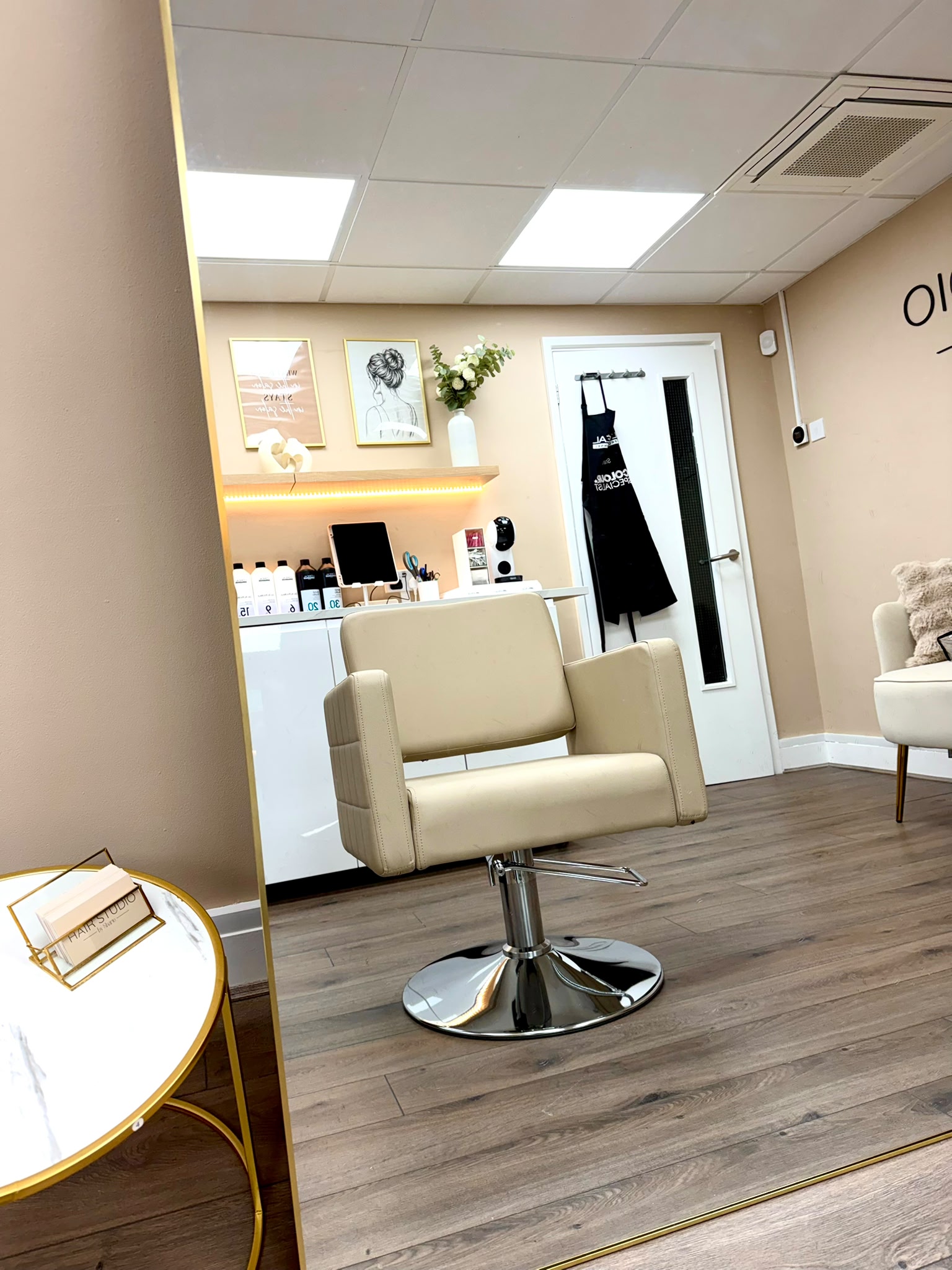 A styling chair inside Hair Studio by Sharie in Jacobs Well, Guildford